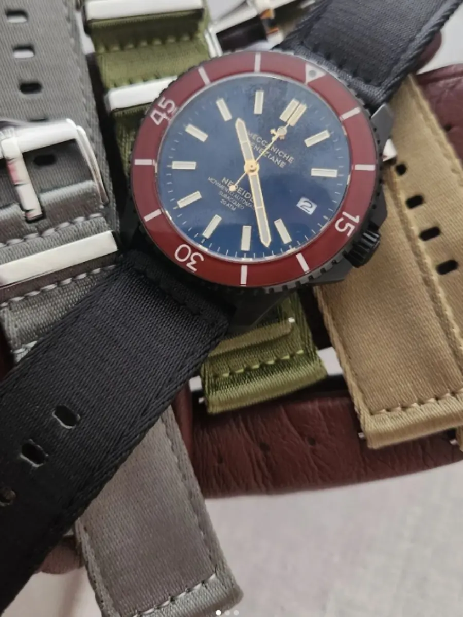 DVIL leather strap rotation with a diver watch A rotation of DVIL leather watch straps arranged beneath a diver-style watch